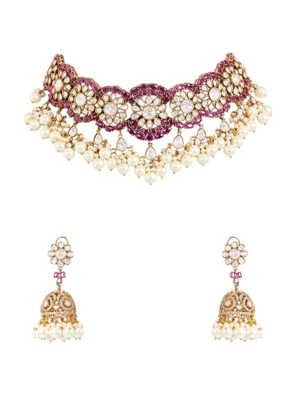 Gold Finish Kundan Polki & Deep Ruby Stone Choker Necklace Set - Auraa Trends - Necklace -  - Auraa Trends - Gold finish choker necklace with kundan polki, ruby stones, pearls, and floral motifs Traditional Indian bridal choker set with jhumka earrings Ruby red kundan polki necklace with matching jhumka earrings Floral motif choker necklace in gold with pearls and ruby accents