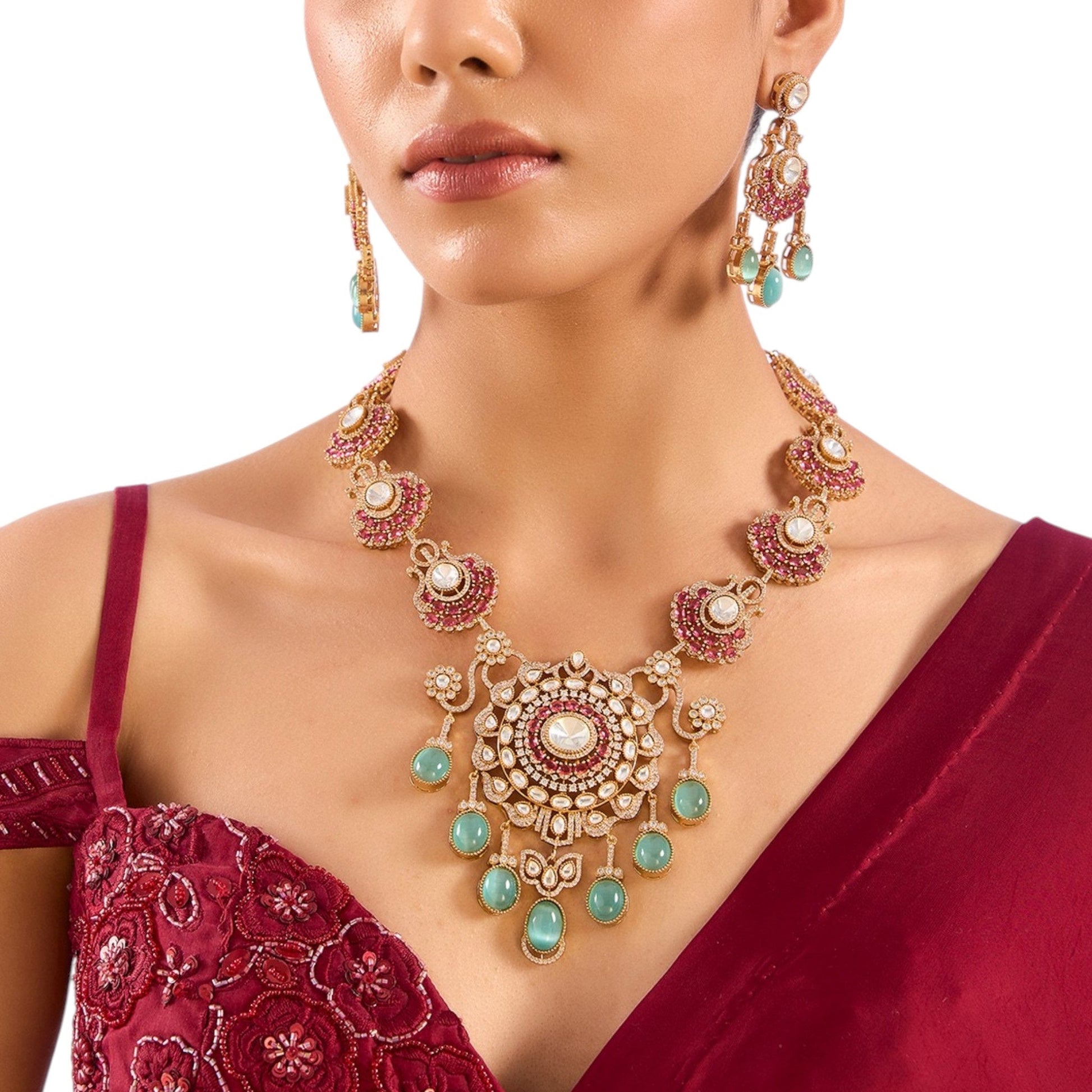 Gold Finish Kundan Polki & Ruby Drop Necklace Set - Auraa Trends - Necklace -  - Auraa Trends - Gold Finish Kundan Polki Necklace with Ruby and Emerald Drops Traditional Necklace Set with Matching Earrings for Weddings Bridal Kundan Necklace Set with Green and Red Gemstone Accents