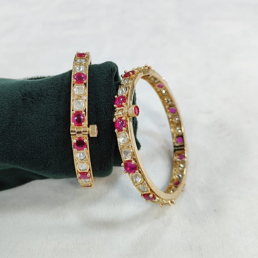 Gold - Plated Bangles with Pink and White Stones - Auraa Trends - Bangles -  - Auraa Trends - Gold - plated bangles with alternating pink and white stones, displayed on a green velvet roll against a white background – ethnic kada set for women.