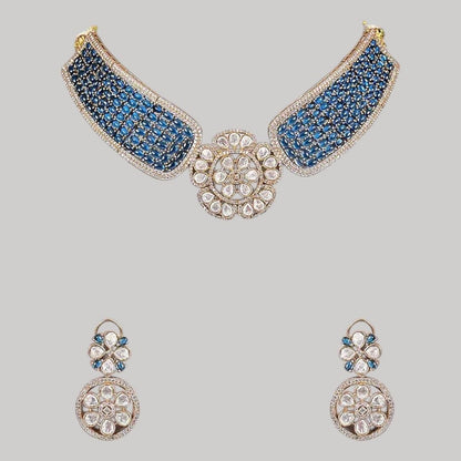 Gold - Plated Blue Stone Encrusted Choker Necklace Set with Floral Earrings - Auraa Trends - Necklace Set -  - Auraa Trends - Model wearing a gold - plated blue stone choker necklace set with kundan - style floral centerpiece and matching floral earrings, perfect for modern ethnic looks.