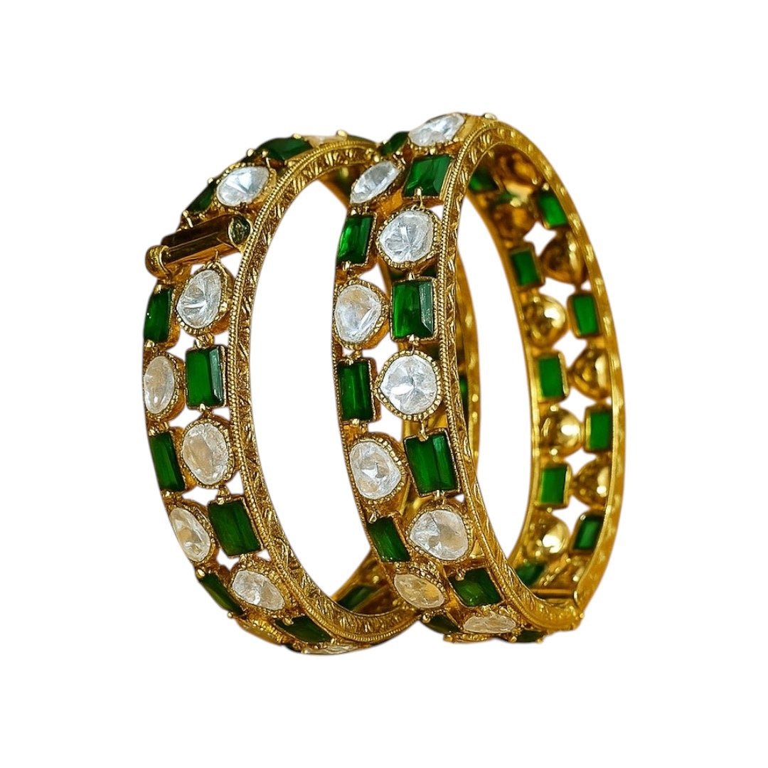 Gold - Plated Green & White Stone Studded Ethnic Bangles for Women - Auraa Trends - Bangles -  - Auraa Trends - Close - up view of gold - plated ethnic bangles with green and white stones on a yellow background