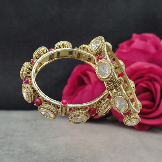 Gold Plated Pink Bead Kundan Studded Traditional Bangles for Women - Auraa Trends - Bangles -  - Auraa Trends - Traditional gold plated bangles with white kundan stones and pink beads – festive Indian bridal jewelry for women.