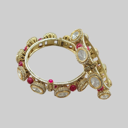 Gold Plated Pink Bead Kundan Studded Traditional Bangles for Women - Auraa Trends - Bangles -  - Auraa Trends - Traditional gold plated bangles with white kundan stones and pink beads – festive Indian bridal jewelry for women.