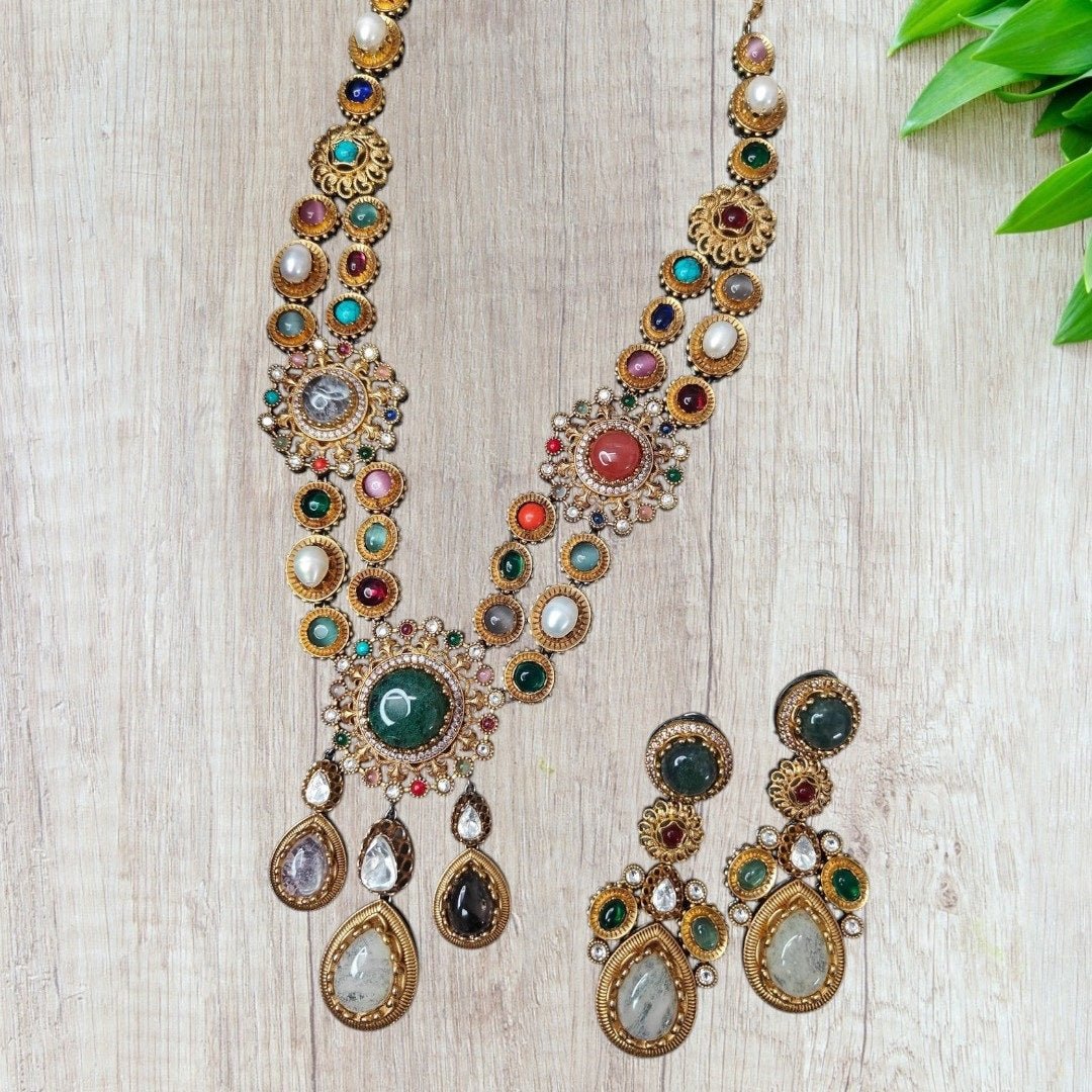Grand Multicolor Temple Style Kundan Necklace Set - Auraa Trends - Necklace Set -  - Auraa Trends - "Antique gold - plated temple - style multicolor necklace set with matching earrings, featuring Kundan stones, pearls, and teardrop dangles