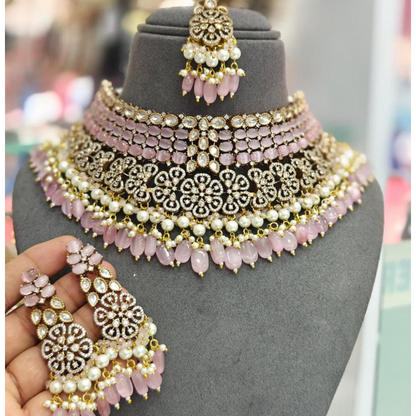 "Bridal Kundan choker necklace set with green beads, pearls, and matching earrings and maang tikka – traditional Indian jewelry for women"