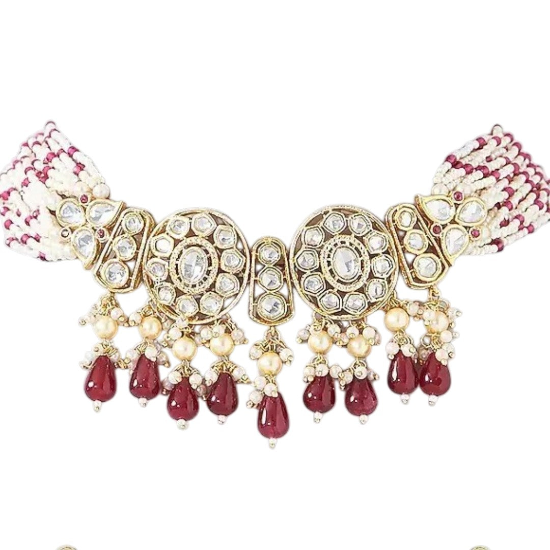 Kundan choker necklace with two round medallions, ruby-red teardrop beads and white pink beaded strands, shown with matching earrings