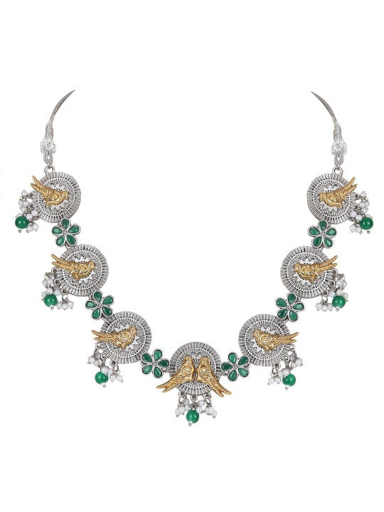 Oxidised silver-tone necklace set with gold-tone bird motifs, green enamel flowers, green bead drops, and matching earrings