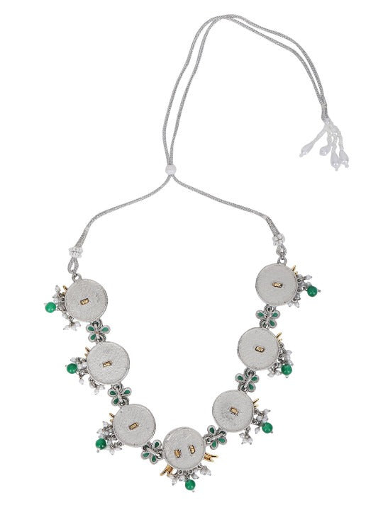 Oxidised silver-tone necklace set with gold-tone bird motifs, green enamel flowers, green bead drops, and matching earrings