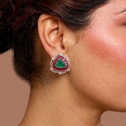 Pair of gold halo stud earrings with emerald-green triangle centre stones, ruby-pink baguette borders and zircon
