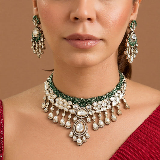 Gold finish Victorian kundan bridal necklace set with emerald green stones, polki-style pear drops, large centre pendant and matching chandelier earrings – Auraa Trends