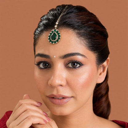 Gold finish American diamond maang tikka with emerald green pear centre stone, green marquise floral border, zircon accents and delicate chain – Auraa Trends