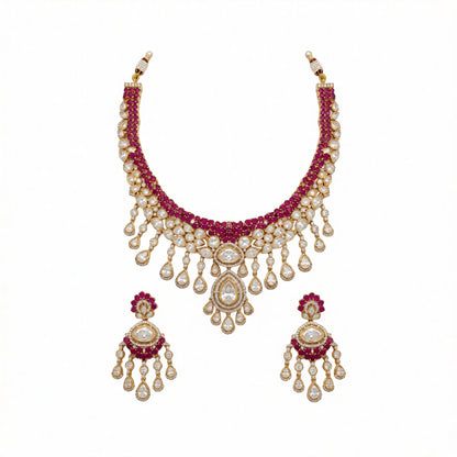 Gold kundan polki ruby red bridal choker necklace set with teardrop fringe and matching chandelier earrings by Auraa Trends
