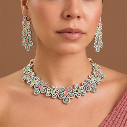 Silver-tone American diamond floral choker necklace set with coral-pink, light-green and mint stones and matching long drop earrings