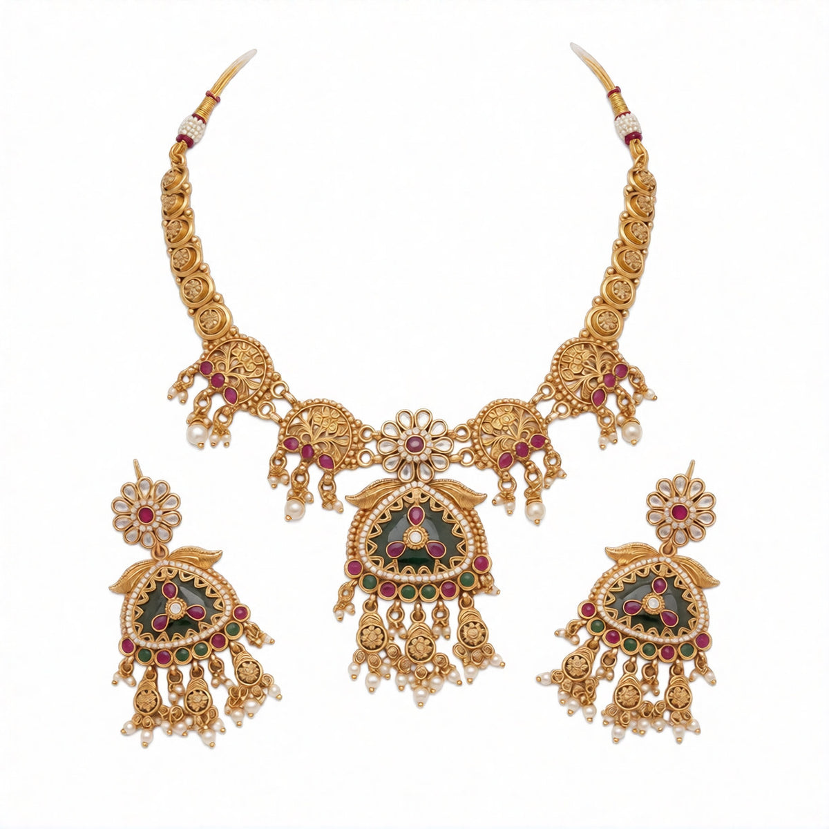 Antique matte gold temple necklace set with green triangular pendant, ruby pink stones, pearl drops and matching chandelier earrings on teal bust