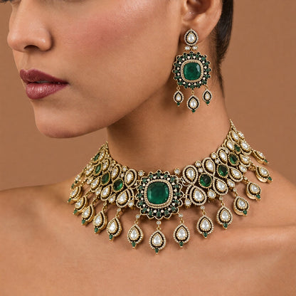 Antique gold emerald green kundan polki bridal choker necklace set with teardrop fringe and matching chandelier earrings