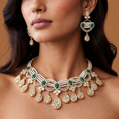 Gold-finish emerald green seed pearl kundan polki choker necklace set with teardrop drops and matching pearl drop earrings
