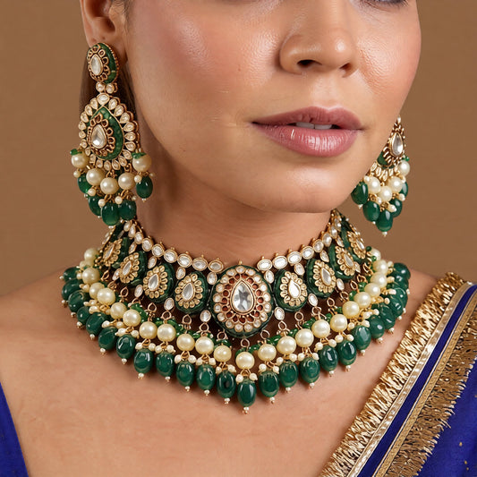Gold-finish green meenakari kundan polki bridal choker necklace set with pearl and emerald bead drops and matching chandelier earrings