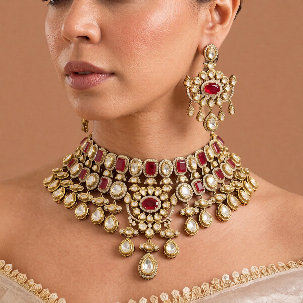 Antique gold ruby red Victorian bridal choker necklace set with kundan-style stones, ruby oval centre medallion, pear drops and matching chandelier earrings