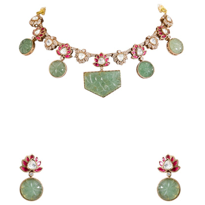 Lotus Motif Carved Green Stone Necklace Set with Earrings | Ethnic & Festive Jewelry - Auraa Trends - Necklace -  - Auraa Trends - “Necklace set with lotus motif and carved green stones with earrings” “Traditional gold - tone necklace with pink lotus and kundan stones” “Ethnic lotus design choker set with matching earrings”