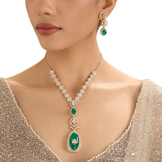 Regal Long Pendant Necklace Set with Emerald Green Centerpiece – Statement Bridal Jewelry - Auraa Trends - necklace -  - Auraa Trends - Long gold - finish pendant necklace adorned with a dramatic emerald green centerpiece and coordinated drop earrings, perfect for bridal or reception attire.