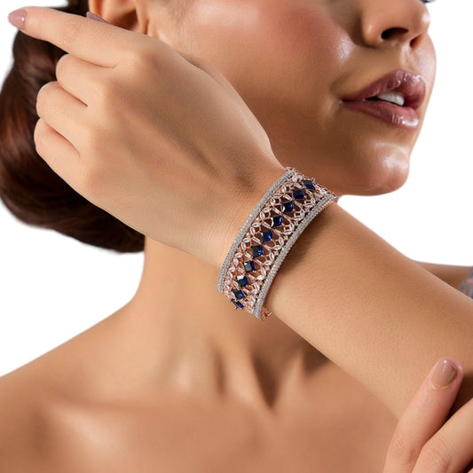 Rose Gold - Plated Designer Bangle with Blue Square Stones and Cubic Zirconia for Women - Auraa Trends - Bangles -  - Auraa Trends - Elegant rose gold - plated bangle with blue square stones and CZ, ideal for festive and party wear.