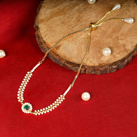 Sumptuous Gold Plated Kundan Rakhi Bracelet - Auraa Trends - Rakhi - Trends - Sumptuous Gold Plated Kundan Rakhi Bracelet