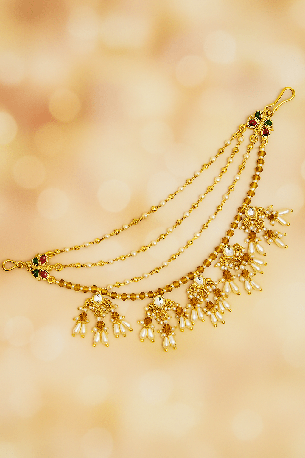 Traditional Kundan & Pearl Multi - Layer Kaan Chain - Auraa Trends - Kaan chain -  - Auraa Trends - Elegant multi - layered Kundan and pearl golden Kaan Chain (Ear Chain) with floral motifs and dangling pearl drops, displayed with decorative flowers and seashell.