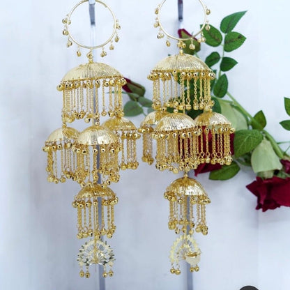 Traditional Punjabi Bridal Kalire with Golden Ghungroo Chains & Lotus Motif - Auraa Trends - Kaleere -  - Auraa Trends - "Traditional Punjabi bridal kalire with lotus motif and golden ghungroo chains" "Multi - tiered gold plated kalire for bride with hanging chains" "Handcrafted bridal wedding accessory with lotus drop design" "Ethnic Punjabi kalire with micro gold plating for Indian weddings
